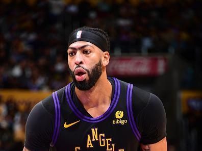 LOS ANGELES, CA - DECEMBER 18:  Anthony Davis #3 of the Los Angeles Lakers shoots a free throw during the game  on December 18, 2023 at Crypto.Com Arena in Los Angeles, California. NOTE TO USER: User expressly acknowledges and agrees that, by downloading and/or using this Photograph, user is consenting to the terms and conditions of the Getty Images License Agreement. Mandatory Copyright Notice: Copyright 2023 NBAE (Photo by Adam Pantozzi/NBAE via Getty Images)