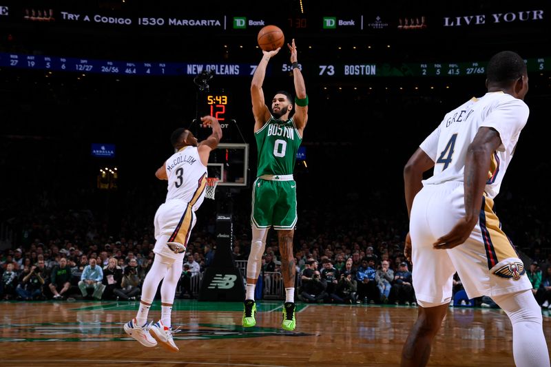 BOSTON, MA - JANUARY 12: Jayson Tatum #0 of the Boston Celtics shoots a three point basket during the game against the New Orleans Pelicans on January 12, 2025 at TD Garden in Boston, Massachusetts. NOTE TO USER: User expressly acknowledges and agrees that, by downloading and/or using this Photograph, user is consenting to the terms and conditions of the Getty Images License Agreement. Mandatory Copyright Notice: Copyright 2025 NBAE (Photo by Brian Babineau/NBAE via Getty Images)