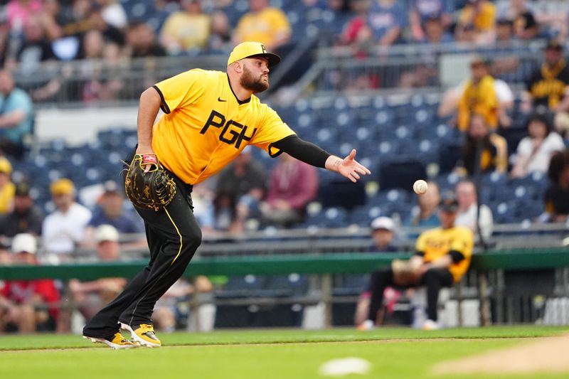 May 3, 2024; Pittsburgh, Pennsylvania, USA; Pittsburgh Pirates first baseman Rowdy Tellez (44) flips the ball to first base to record an out after fielding a ground ball during the fourth inning at PNC Park. Mandatory Credit: Gregory Fisher-USA TODAY Sports