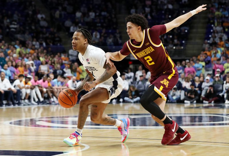 Jan 27, 2024; University Park, Pennsylvania, USA; Penn State Nittany Lions guard Ace Baldwin Jr (1) dribbles passed Minnesota Golden Gophers guard Mike Mitchell Jr (2) during the first half at Bryce Jordan Center. Mandatory Credit: Matthew O'Haren-USA TODAY Sports