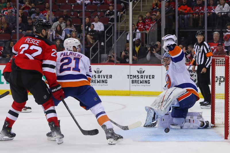 Oct 25, 2024; Newark, New Jersey, USA; New York Islanders goaltender Ilya Sorokin (30) makes a save against the New Jersey Devils during overtime at Prudential Center. Mandatory Credit: Ed Mulholland-Imagn Images