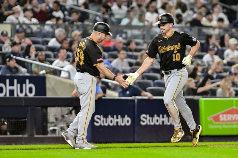 Sep 27, 2024; Bronx, New York, USA; Pittsburgh Pirates outfielder Bryan Reynolds (10) rounds the bases after hitting a two run home run against the New York Yankees during the eighth inning at Yankee Stadium. Mandatory Credit: John Jones-Imagn Images