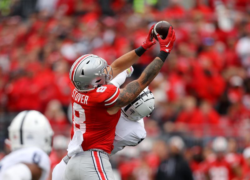 Oct 21, 2023; Columbus, Ohio, USA;  Ohio State Buckeyes tight end Cade Stover (8) catches the football against the Penn State Nittany Lions during the third quarter at Ohio Stadium. Mandatory Credit: Joseph Maiorana-USA TODAY Sports