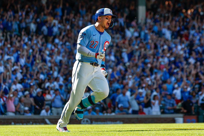 Sep 26, 2025; Chicago, Illinois, USA; Chicago Cubs right fielder Seiya Suzuki (27) rounds the bases after hitting a grand slam against the St. Louis Cardinals during the seventh inning at Wrigley Field. Mandatory Credit: Kamil Krzaczynski-Imagn Images