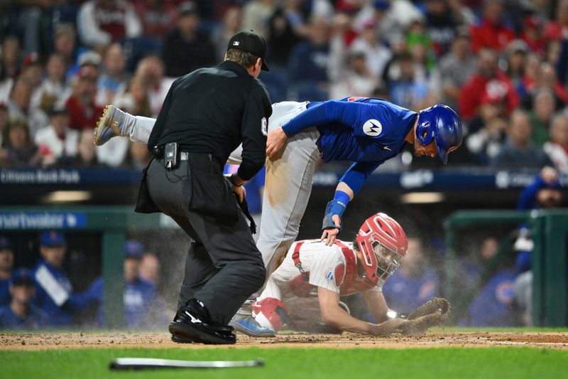 Sep 24, 2024; Philadelphia, Pennsylvania, USA; Chicago Cubs outfielder Ian Happ (8) slides home to score against Philadelphia Phillies catcher Garrett Stubbs (21) in the second inning at Citizens Bank Park. Mandatory Credit: Kyle Ross-Imagn Images