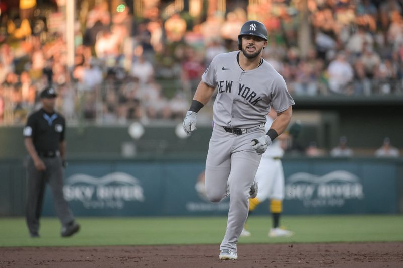 May 9, 2025; West Sacramento, California, USA; New York Yankees outfielder Jasson Dominguez (24) rounds the bases after hitting a home run against the Athletics during the third inning at Sutter Health Park. Mandatory Credit: Ed Szczepanski-Imagn Images