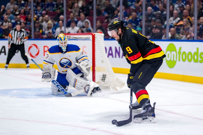 Mar 19, 2024; Vancouver, British Columbia, CAN; Vancouver Canucks forward J.T. Miller (9) handles the puck against the Buffalo Sabres in the first period at Rogers Arena. Vancouver won 3 -2. Mandatory Credit: Bob Frid-USA TODAY Sports