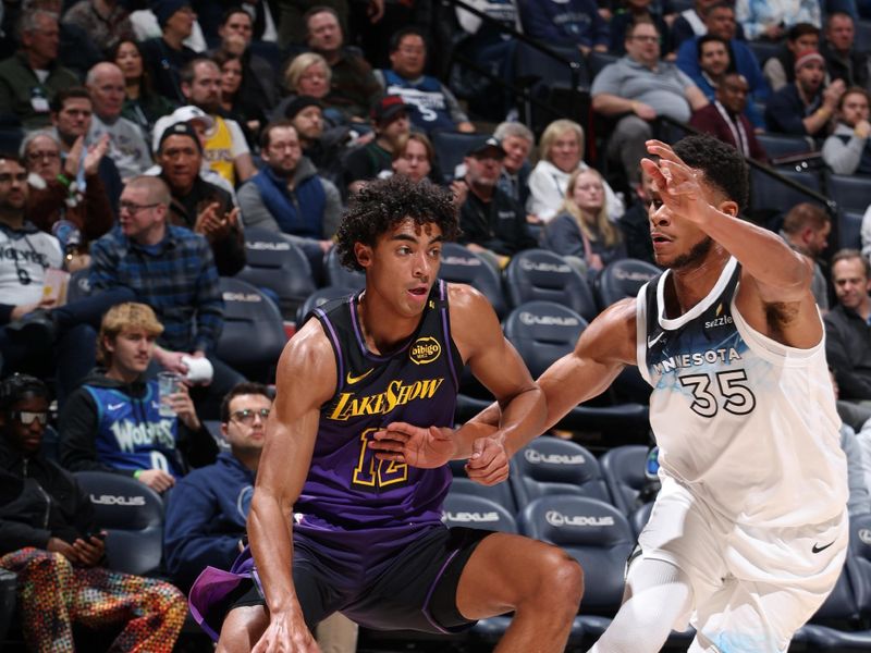 MINNEAPOLIS, MN -  DECEMBER 2: Max Christie #12 of the Los Angeles Lakers drives to the basket during the game against the Minnesota Timberwolves on December 2, 2024 at Target Center in Minneapolis, Minnesota. NOTE TO USER: User expressly acknowledges and agrees that, by downloading and or using this Photograph, user is consenting to the terms and conditions of the Getty Images License Agreement. Mandatory Copyright Notice: Copyright 2024 NBAE (Photo by David Sherman/NBAE via Getty Images)