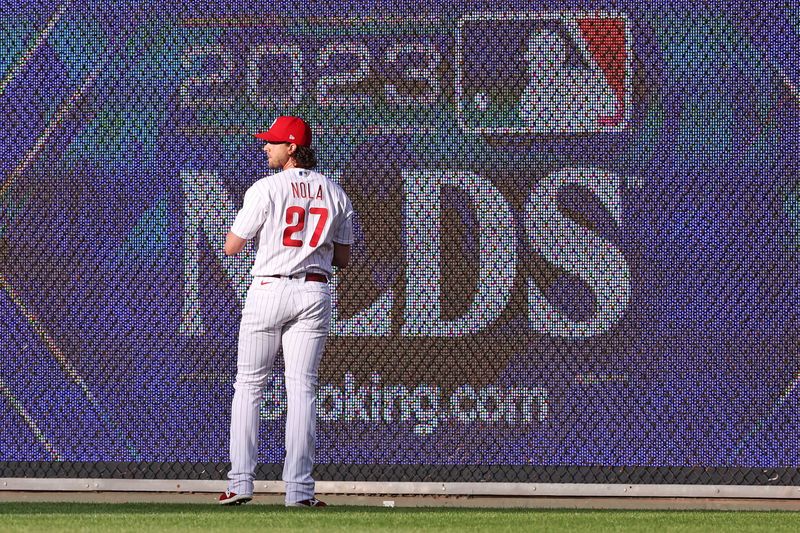 Oct 11, 2023; Philadelphia, Pennsylvania, USA;  Philadelphia Phillies starting pitcher Aaron Nola (27) warms up before playing against the Atlanta Braves in game three of the NLDS for the 2023 MLB playoffs at Citizens Bank Park. Mandatory Credit: Bill Streicher-USA TODAY Sports