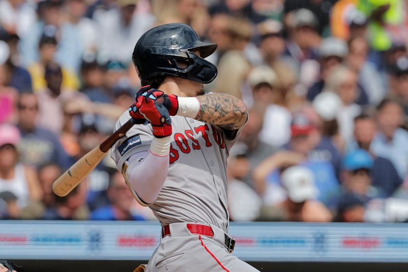 Sep 1, 2024; Detroit, Michigan, USA;  Boston Red Sox outfielder Jarren Duran (16) hits an RBI single in the fifth inning against the Detroit Tigers at Comerica Park. Mandatory Credit: Rick Osentoski-USA TODAY Sports