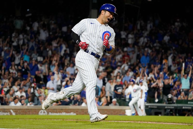 Jul 18, 2023; Chicago, Illinois, USA; Chicago Cubs right fielder Seiya Suzuki (27) runs the bases after hitting a home run against the Washington Nationals during the sixth inning at Wrigley Field. Mandatory Credit: David Banks-USA TODAY Sports