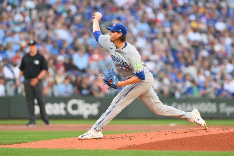 Jul 5, 2024; Seattle, Washington, USA; Toronto Blue Jays starting pitcher Kevin Gausman (34) pitches to the Seattle Mariners during the first inning at T-Mobile Park. Mandatory Credit: Steven Bisig-USA TODAY Sports