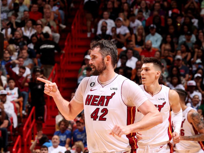 MIAMI, FL - APRIL 1: Kevin Love #42 of the Miami Heat looks on during the game against the Dallas Mavericks  on April 1, 2023 at Miami-Dade Arena in Miami, Florida. NOTE TO USER: User expressly acknowledges and agrees that, by downloading and or using this Photograph, user is consenting to the terms and conditions of the Getty Images License Agreement. Mandatory Copyright Notice: Copyright 2023 NBAE (Photo by Issac Baldizon/NBAE via Getty Images)