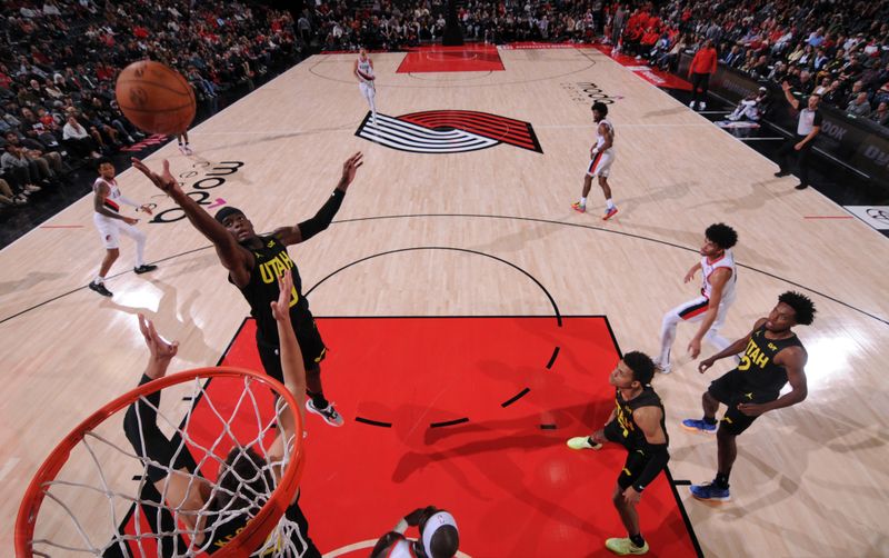 PORTLAND, OR - OCTOBER 18: Taylor Hendricks #0 of the Utah Jazz goes up for the rebound during the game against the Portland Trail Blazers on October 18, 2024 at the Moda Center Arena in Portland, Oregon. NOTE TO USER: User expressly acknowledges and agrees that, by downloading and or using this photograph, user is consenting to the terms and conditions of the Getty Images License Agreement. Mandatory Copyright Notice: Copyright 2024 NBAE (Photo by Cameron Browne/NBAE via Getty Images)