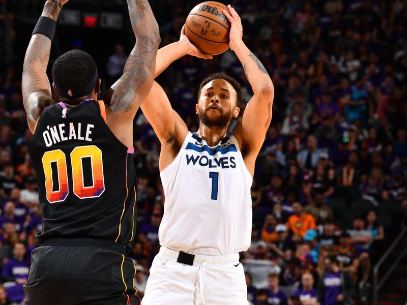 PHOENIX, AZ - APRIL 4: Kyle Anderson #1 of the Minnesota Timberwolves looks to pass the ball during the game against the Phoenix Suns during Round 1 Game 4 of the 2024 NBA Playoffs on April 4, 2023 at Footprint Center in Phoenix, Arizona. NOTE TO USER: User expressly acknowledges and agrees that, by downloading and or using this photograph, user is consenting to the terms and conditions of the Getty Images License Agreement. Mandatory Copyright Notice: Copyright 2024 NBAE (Photo by Barry Gossage/NBAE via Getty Images)