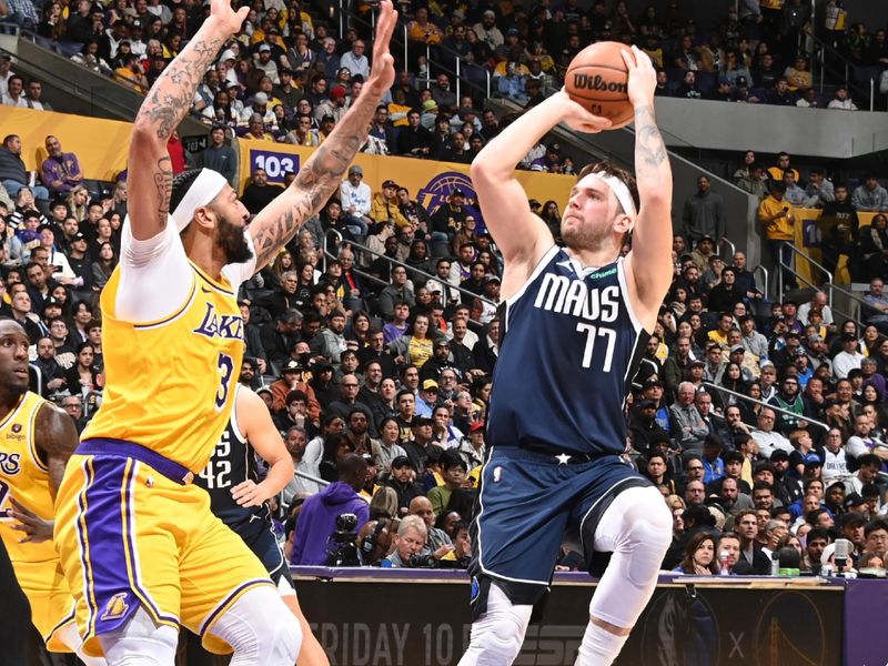 LOS ANGELES, CA - JANUARY 17:  Luka Doncic #77 of the Dallas Mavericks shoots the ball during the game  on January 17, 2024 at Crypto.Com Arena in Los Angeles, California. NOTE TO USER: User expressly acknowledges and agrees that, by downloading and/or using this Photograph, user is consenting to the terms and conditions of the Getty Images License Agreement. Mandatory Copyright Notice: Copyright 2024 NBAE (Photo by Andrew D. Bernstein/NBAE via Getty Images)