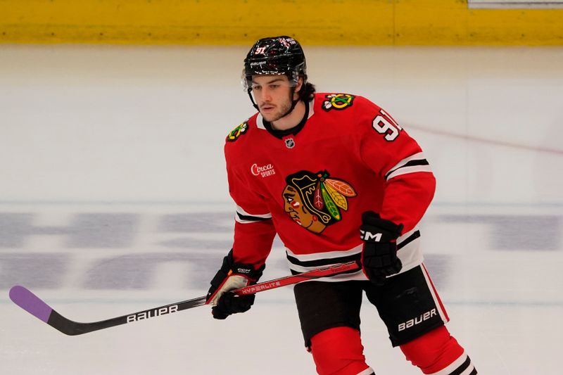 Jan 26, 2025; Chicago, Illinois, USA; Chicago Blackhawks center Frank Nazar (91) warms up before a game against the Minnesota Wild at United Center. Mandatory Credit: David Banks-Imagn Images