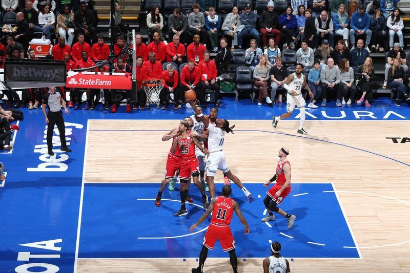 MINNEAPOLIS, MN -  MARCH 31: Naz Reid #11 of the Minnesota Timberwolves drives to the basket during the game against the Chicago Bulls on March 31, 2024 at Target Center in Minneapolis, Minnesota. NOTE TO USER: User expressly acknowledges and agrees that, by downloading and or using this Photograph, user is consenting to the terms and conditions of the Getty Images License Agreement. Mandatory Copyright Notice: Copyright 2024 NBAE (Photo by David Sherman/NBAE via Getty Images)