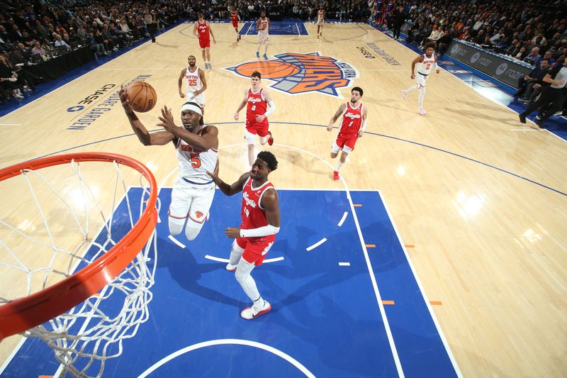 NEW YORK, NY - JANUARY 27: Precious Achiuwa #5 of the New York Knicks drives to the basket during the game against the Memphis Grizzlies on January 27, 2025 at Madison Square Garden in New York City, New York.  NOTE TO USER: User expressly acknowledges and agrees that, by downloading and or using this photograph, User is consenting to the terms and conditions of the Getty Images License Agreement. Mandatory Copyright Notice: Copyright 2025 NBAE  (Photo by Nathaniel S. Butler/NBAE via Getty Images)