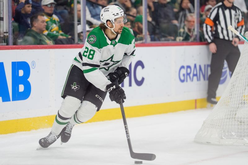 Dec 11, 2025; Saint Paul, Minnesota, USA; Minnesota Wild left wing Liam Ohgren (28) controls the puck against the Minnesota Wild in the first period at Grand Casino Arena. Mandatory Credit: Matt Blewett-Imagn Images