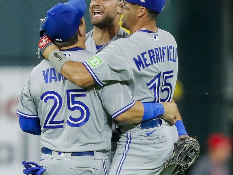 Aug 19, 2023; Cincinnati, Ohio, USA; Toronto Blue Jays left fielder Daulton Varsho (25), center fielder Kevin Kiermaier (39) and right fielder Whit Merrifield (15) celebrate the victory over the Cincinnati Reds at Great American Ball Park. Mandatory Credit: Katie Stratman-USA TODAY Sports