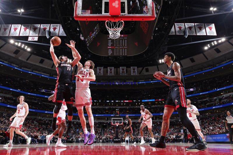 CHICAGO, IL - FEBRUARY 4:  Jaime Jaquez Jr. #11 of the Miami Heat drives to the basket during the game against the Chicago Bulls on February 4 2025 at United Center in Chicago, Illinois. NOTE TO USER: User expressly acknowledges and agrees that, by downloading and or using this photograph, User is consenting to the terms and conditions of the Getty Images License Agreement. Mandatory Copyright Notice: Copyright 2025 NBAE (Photo by Jeff Haynes/NBAE via Getty Images)