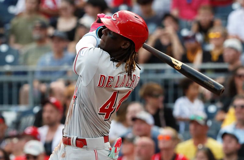 Aug 13, 2023; Pittsburgh, PA, USA; Cincinnati Reds shortstop Elly De La Cruz (44) hits a solo home run against the Pittsburgh Pirates during the third inning at PNC Park. Mandatory Credit: Charles LeClaire-USA TODAY Sports