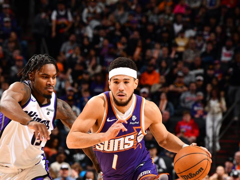 PHOENIX, AZ - FEBRUARY 13:  Devin Booker #1 of the Phoenix Suns handles the ball during the game against the Sacramento Kings on February 13, 2024 at Footprint Center in Phoenix, Arizona. NOTE TO USER: User expressly acknowledges and agrees that, by downloading and or using this photograph, user is consenting to the terms and conditions of the Getty Images License Agreement. Mandatory Copyright Notice: Copyright 2024 NBAE (Photo by Barry Gossage/NBAE via Getty Images)