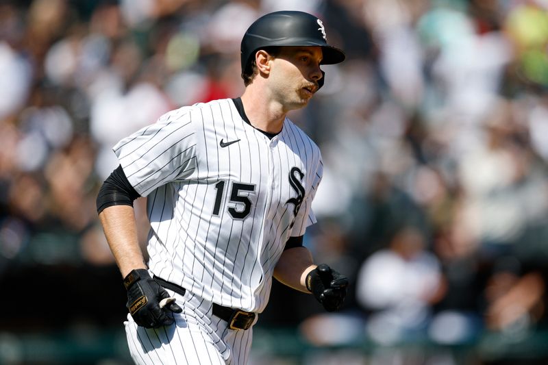 May 25, 2025; Chicago, Illinois, USA; Chicago White Sox left fielder Austin Slater (15) rounds the bases after hitting a solo home run against the Texas Rangers during the sixth inning at Rate Field. Mandatory Credit: Kamil Krzaczynski-Imagn Images