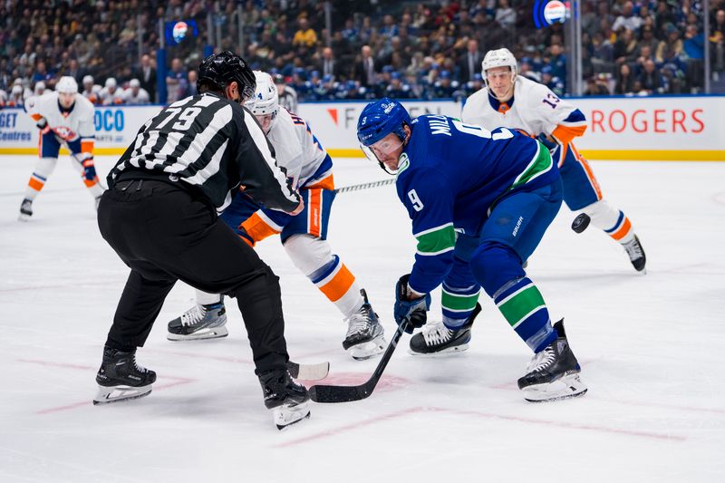 Nov 15, 2023; Vancouver, British Columbia, CAN; Vancouver Canucks forward J.T. Miller (9) wins a face off draw against New York Islanders forward Jean-Gabriel Pageau (44) in the first period at Rogers Arena. Mandatory Credit: Bob Frid-USA TODAY Sports