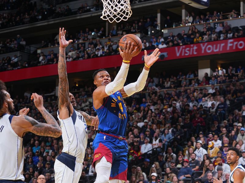 DENVER, CO - NOVEMBER 22: Russell Westbrook #4 of the Denver Nuggets shoots the ball during the game against the Dallas Mavericks  during the Emirates NBA Cup game on November 22, 2024 at Ball Arena in Denver, Colorado. NOTE TO USER: User expressly acknowledges and agrees that, by downloading and/or using this Photograph, user is consenting to the terms and conditions of the Getty Images License Agreement. Mandatory Copyright Notice: Copyright 2024 NBAE (Photo by Bart Young/NBAE via Getty Images)