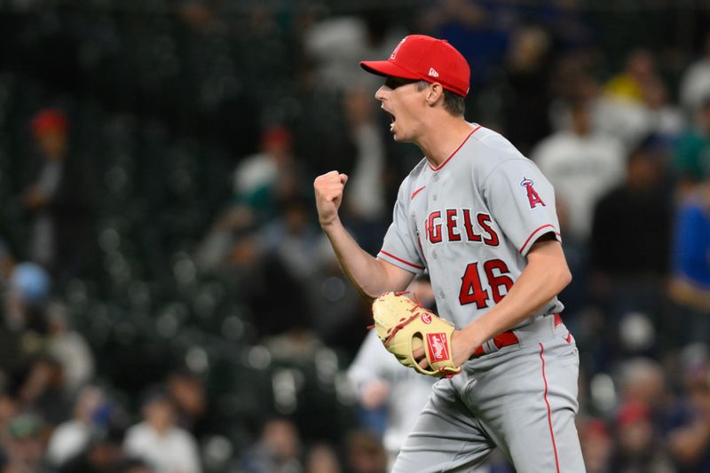 Sep 11, 2023; Seattle, Washington, USA; Los Angeles Angels relief pitcher Jimmy Herget (46) celebrates after defeating the Seattle Mariners at T-Mobile Park. Mandatory Credit: Steven Bisig-USA TODAY Sports