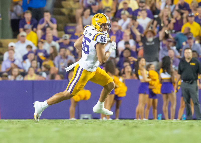 Sep 23, 2023; Baton Rouge, Louisiana, USA; LSU Tigers tight end Mason Taylor (86) runs the ball during the game against Arkansas Razorbacks at Tiger Stadium. Mandatory Credit: Scott Clause-USA TODAY Sports