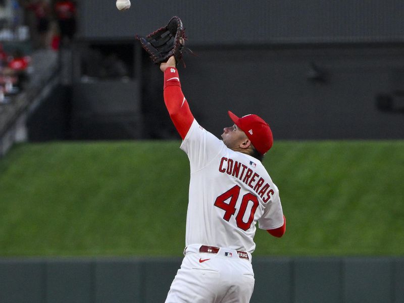 Jul 10, 2025; St. Louis, Missouri, USA; St. Louis Cardinals first baseman Willson Contreras (40) leaps and fields a ball against the Washington Nationals during the fifth inning at Busch Stadium. Mandatory Credit: Jeff Curry-Imagn Images Jul 10, 2025; St. Louis, Missouri, USA; St. Louis Cardinals first baseman Willson Contreras (40) leaps and fields a ball against the Washington Nationals during the fifth inning at Busch Stadium. Mandatory Credit: Jeff Curry-Imagn Images