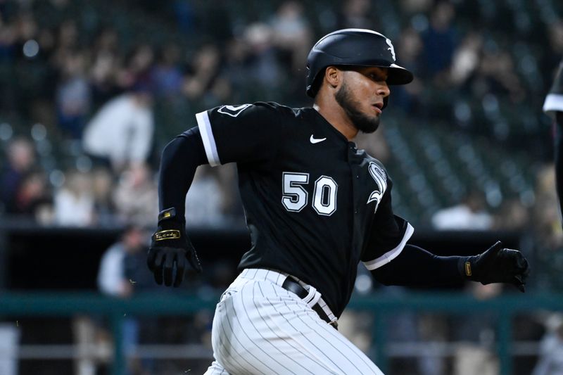 Sep 12, 2023; Chicago, Illinois, USA; Chicago White Sox second baseman Lenyn Sosa (50) runs to first base after hitting asn RBI sacrifice fly ball against the Kansas City Royals during the sixth inning at Guaranteed Rate Field. Mandatory Credit: Matt Marton-USA TODAY Sports