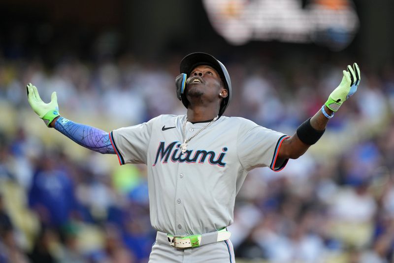 May 7, 2024; Los Angeles, California, USA; Miami Marlins center fielder Jazz Chisholm Jr. (2) celebrates after hitting a home run in the first inning against the Los Angeles Dodgers at Dodger Stadium. Mandatory Credit: Kirby Lee-USA TODAY Sports