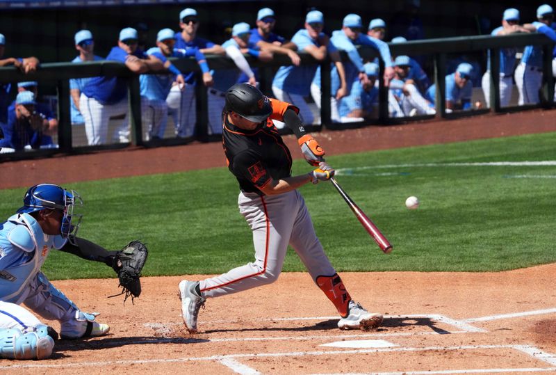 Mar 11, 2024; Surprise, Arizona, USA; San Francisco Giants shortstop Casey Schmitt (10) hits a home run against the Kansas City Royals during the second inning at Surprise Stadium. Mandatory Credit: Joe Camporeale-USA TODAY Sports