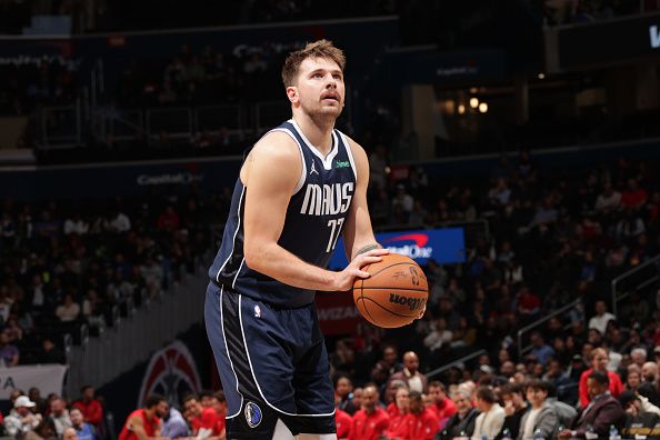 WASHINGTON, DC -? NOVEMBER 15: Luka Doncic #77 of the Dallas Mavericks shoots a free throw during the game against the Washington Wizards on November 15, 2023 at Capital One Arena in Washington, DC. NOTE TO USER: User expressly acknowledges and agrees that, by downloading and or using this Photograph, user is consenting to the terms and conditions of the Getty Images License Agreement. Mandatory Copyright Notice: Copyright 2023 NBAE (Photo by KeShawn Ennis/NBAE via Getty Images)