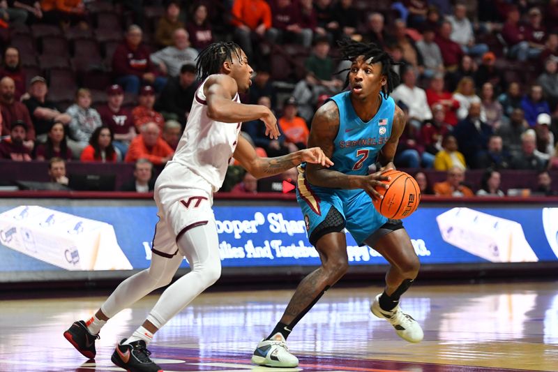 Feb 13, 2024; Blacksburg, Virginia, USA; Florida State Seminoles forward Jamir Watkins (2) looks to pass the ball while being defended by Virginia Tech Hokies guard MJ Collins (2)  at Cassell Coliseum. Mandatory Credit: Brian Bishop-USA TODAY Sports