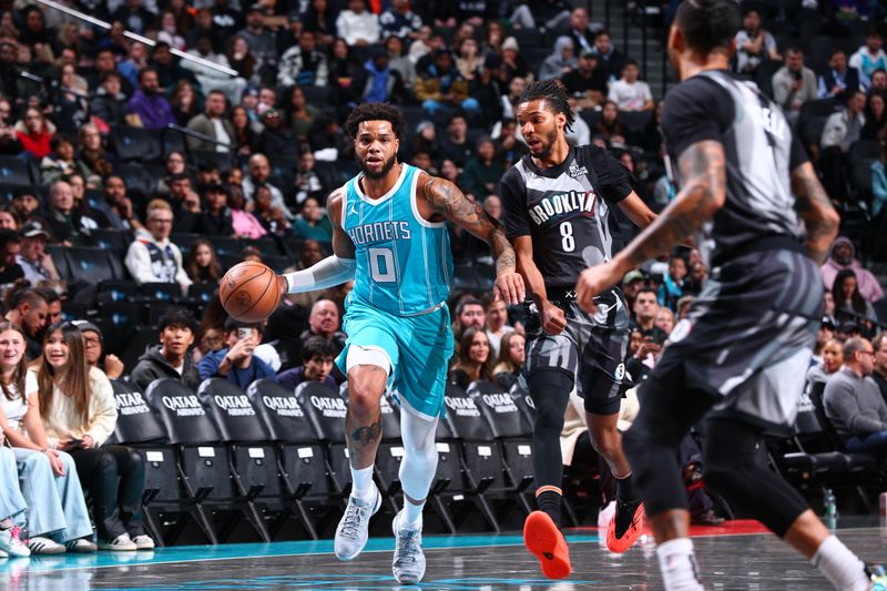 BROOKLYN, NY - FEBRUARY 10: Miles Bridges #0 of the Charlotte Hornets dribbles the ball during the game against the Brooklyn Nets  on February 10, 2025 at Barclays Center in Brooklyn, New York. NOTE TO USER: User expressly acknowledges and agrees that, by downloading and or using this Photograph, user is consenting to the terms and conditions of the Getty Images License Agreement. Mandatory Copyright Notice: Copyright 2025 NBAE (Photo by David L. Nemec/NBAE via Getty Images)