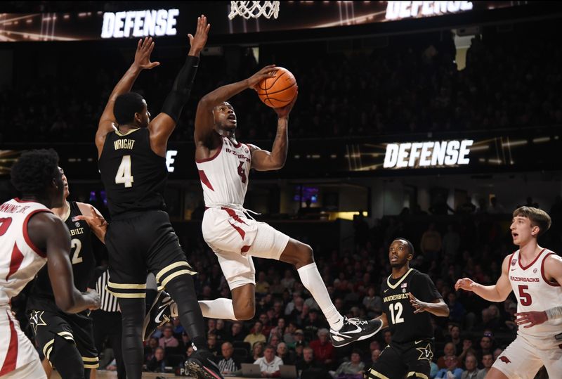 Jan 14, 2023; Nashville, Tennessee, USA; Arkansas Razorbacks guard Davonte Davis (4) scores in the lane during the second half against the Vanderbilt Commodores at Memorial Gymnasium. Mandatory Credit: Christopher Hanewinckel-USA TODAY Sports