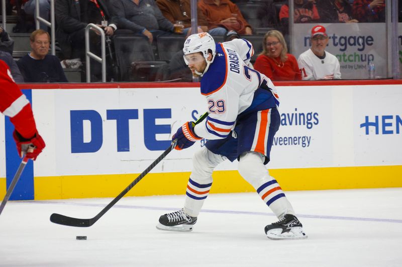 Oct 27, 2024; Detroit, Michigan, USA; Edmonton Oilers center Leon Draisaitl (29) handles the puck during the third period of the game against the Detroit Red Wings at Little Caesars Arena. Mandatory Credit: Brian Bradshaw Sevald-Imagn Images