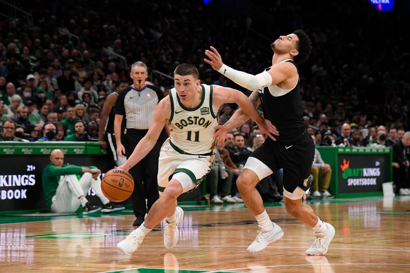 BOSTON, MA - FEBRUARY 4: Payton Pritchard #11 of the Boston Celtics handles the ball during the game  against the Memphis Grizzlies on February 4, 2024 at the TD Garden in Boston, Massachusetts. NOTE TO USER: User expressly acknowledges and agrees that, by downloading and or using this photograph, User is consenting to the terms and conditions of the Getty Images License Agreement. Mandatory Copyright Notice: Copyright 2024 NBAE  (Photo by Brian Babineau/NBAE via Getty Images)