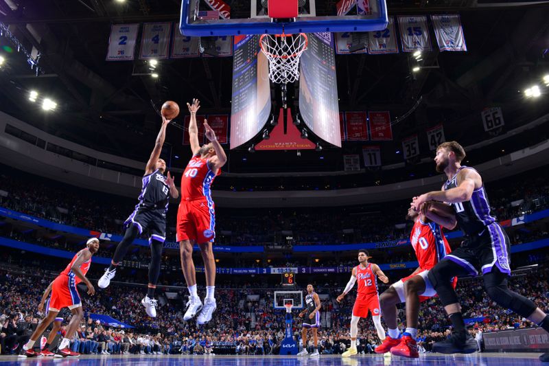 PHILADELPHIA, PA - JANUARY 12:  Keegan Murray #13 of the Sacramento Kings goes to the basket during the game on January 12, 2024 at the Wells Fargo Center in Philadelphia, Pennsylvania NOTE TO USER: User expressly acknowledges and agrees that, by downloading and/or using this Photograph, user is consenting to the terms and conditions of the Getty Images License Agreement. Mandatory Copyright Notice: Copyright 2024 NBAE (Photo by Jesse D. Garrabrant/NBAE via Getty Images)