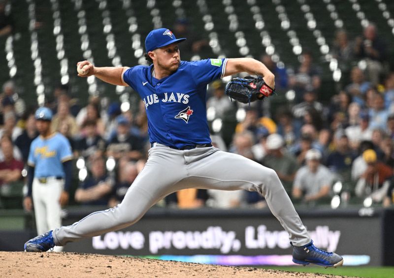 Jun 11, 2024; Milwaukee, Wisconsin, USA; Toronto Blue Jays relief pitcher Nate Pearson (24) delivers a pitch against the Milwaukee Brewers in the sixth inning at American Family Field. Mandatory Credit: Michael McLoone-USA TODAY Sports