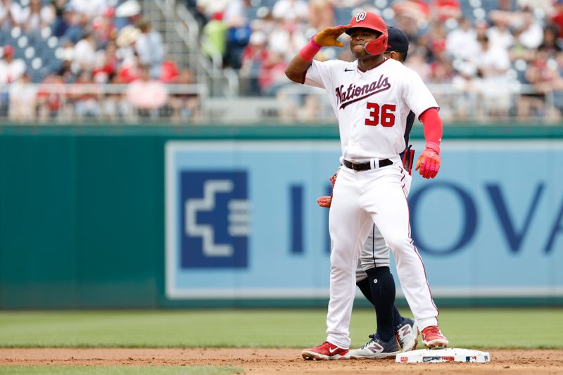 Apr 16, 2023; Washington, District of Columbia, USA; Washington Nationals left fielder Stone Garrett (36) gestures to his dugout after hitting a double against the Cleveland Guardians during the second inning at Nationals Park. Mandatory Credit: Geoff Burke-USA TODAY Sports