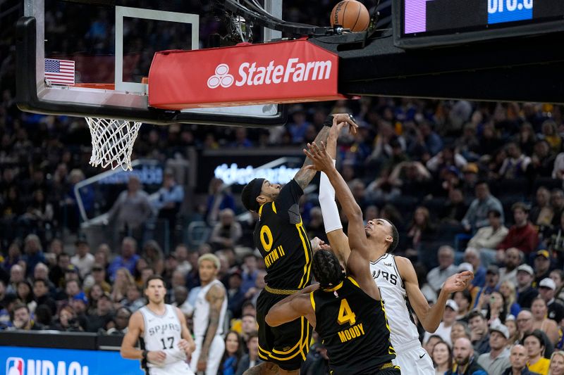 SAN FRANCISCO, CALIFORNIA - NOVEMBER 24: Victor Wembanyama #1 of the San Antonio Spurs is blocked by Gary Payton II #0 of the Golden State Warriors during the second quarter of the NBA In-Season Tournament game at Chase Center on November 24, 2023 in San Francisco, California. NOTE TO USER: User expressly acknowledges and agrees that, by downloading and or using this photograph, User is consenting to the terms and conditions of the Getty Images License Agreement. (Photo by Thearon W. Henderson/Getty Images)