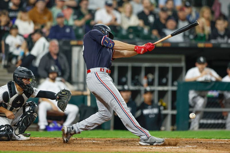 Sep 16, 2023; Chicago, Illinois, USA; Minnesota Twins right fielder Matt Wallner (38) reaches on the fielding error against the Chicago White Sox during the eight inning at Guaranteed Rate Field. Mandatory Credit: Kamil Krzaczynski-USA TODAY Sports