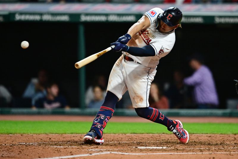 Sep 15, 2023; Cleveland, Ohio, USA; Cleveland Guardians first baseman Josh Naylor (22) hits an RBI single during the fourth inning against the Texas Rangers at Progressive Field. Mandatory Credit: Ken Blaze-USA TODAY Sports