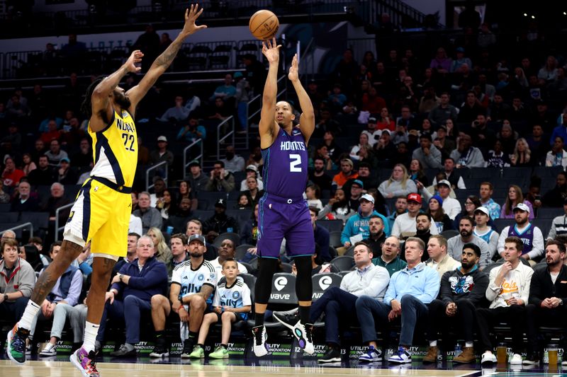 CHARLOTTE, NORTH CAROLINA - FEBRUARY 12: Grant Williams #2 of the Charlotte Hornets shoots the ball during the first half of an NBA game against the Indiana Pacers at Spectrum Center on February 12, 2024 in Charlotte, North Carolina. NOTE TO USER: User expressly acknowledges and agrees that, by downloading and or using this photograph, User is consenting to the terms and conditions of the Getty Images License Agreement. (Photo by David Jensen/Getty Images)